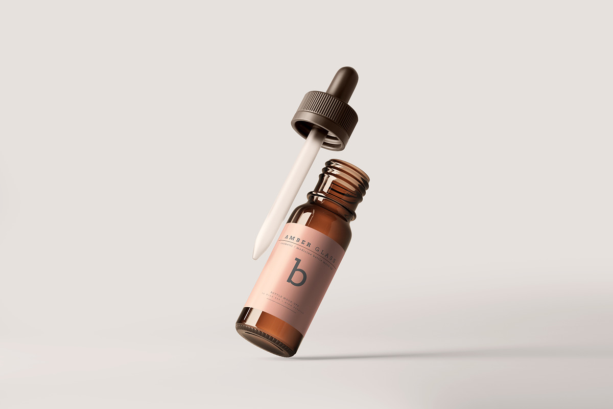 Amber Glass Dropper Bottle Mockups, a Cups & Container Mockup by pmvch (Photo 7 of 20)