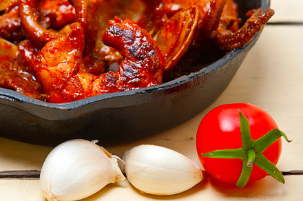 fresh seafoos stew on an iron skillet, a Food & Drink Photo by keko64