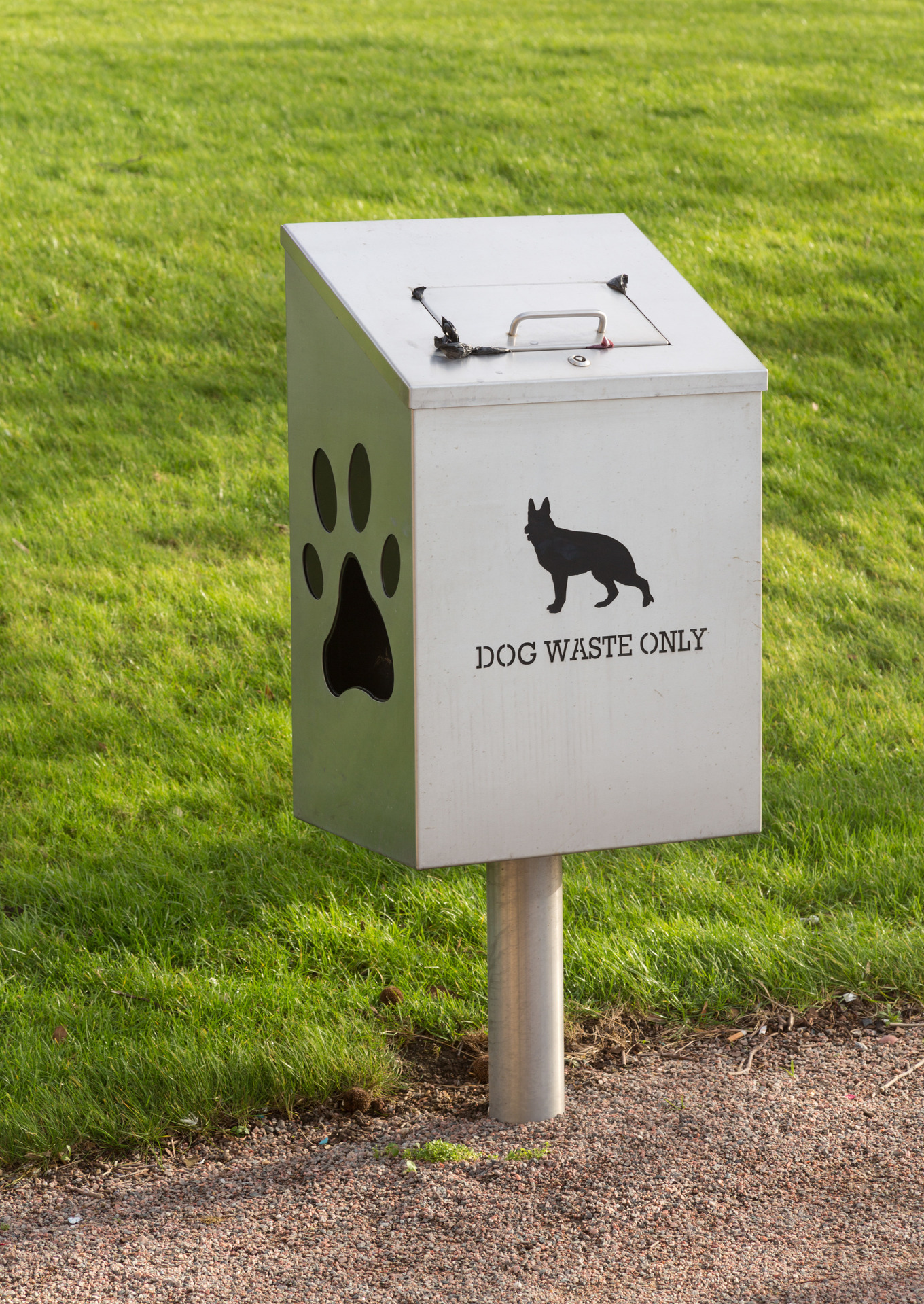 Dog poo droppings waste container, an Architecture Photo by Backyard Stock