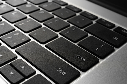 Laptop keyboard with black keys and aluminum metal case., an Abstract Photo by Eugene_Photo