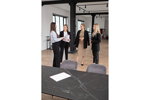 Four businesswomen in formal, a Person Photo by undrey