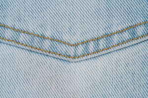 Closeup of light blue denim fabric