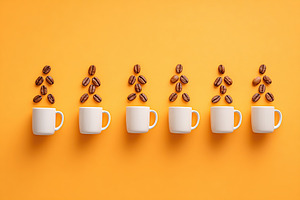 Beans gracefully arranged as if walking into white mugs on a vibrant orange sur, a Food & Drink Photo by AlyaAnd