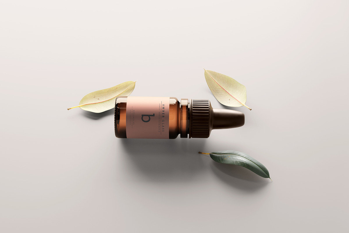 Amber Glass Dropper Bottle Mockups, a Cups & Container Mockup by pmvch (Photo 6 of 20)