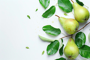 Green pears with leafs and copyspace for text on white background, a Food & Drink Photo by AlyaAnd