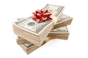 Stacks of One Hundred Dollar Bills with Red Bow On Top., a Business Photo by Andy Dean Photography