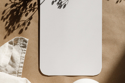 Blank paper sheet on a kraft paper featuring card, paper, and business, an Arts & Entertainment Photo by Edalin's Store