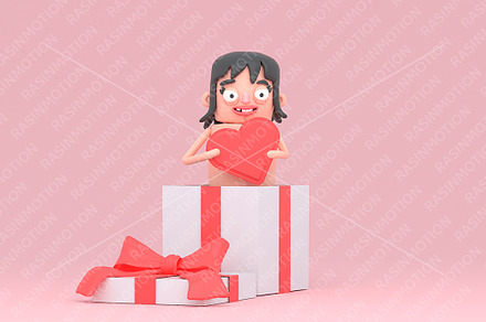 girl holding a big love shape in ...