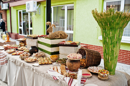Buffet table of reception with cold snacks, meat and salads., a Photo by AS photostudio