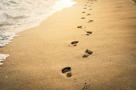 Footprints in the sand stock photo containing footprints and sand, a Nature Photo by hitdelight