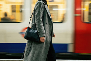 Asian Woman Walking on Platform, a Person Photo by Virgo Studio