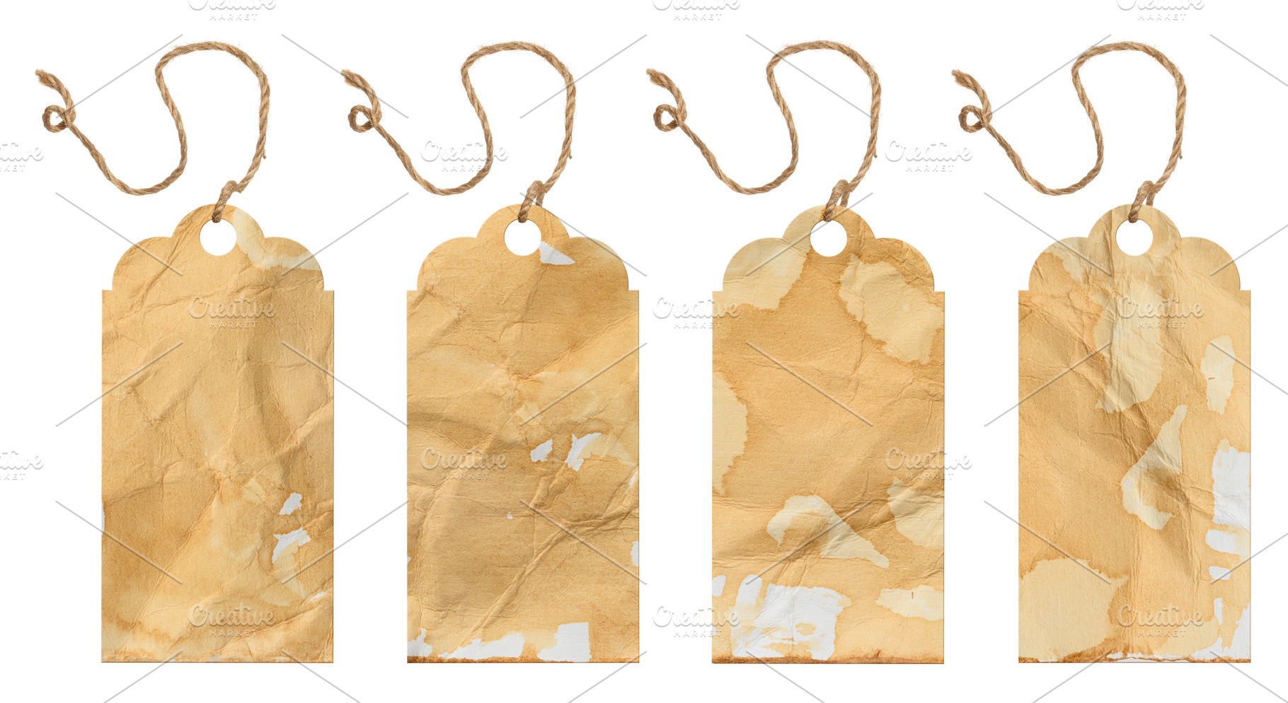 Vintage tags made of paper stained with coffee or tea. Each tag, a Business Photo by ndanko