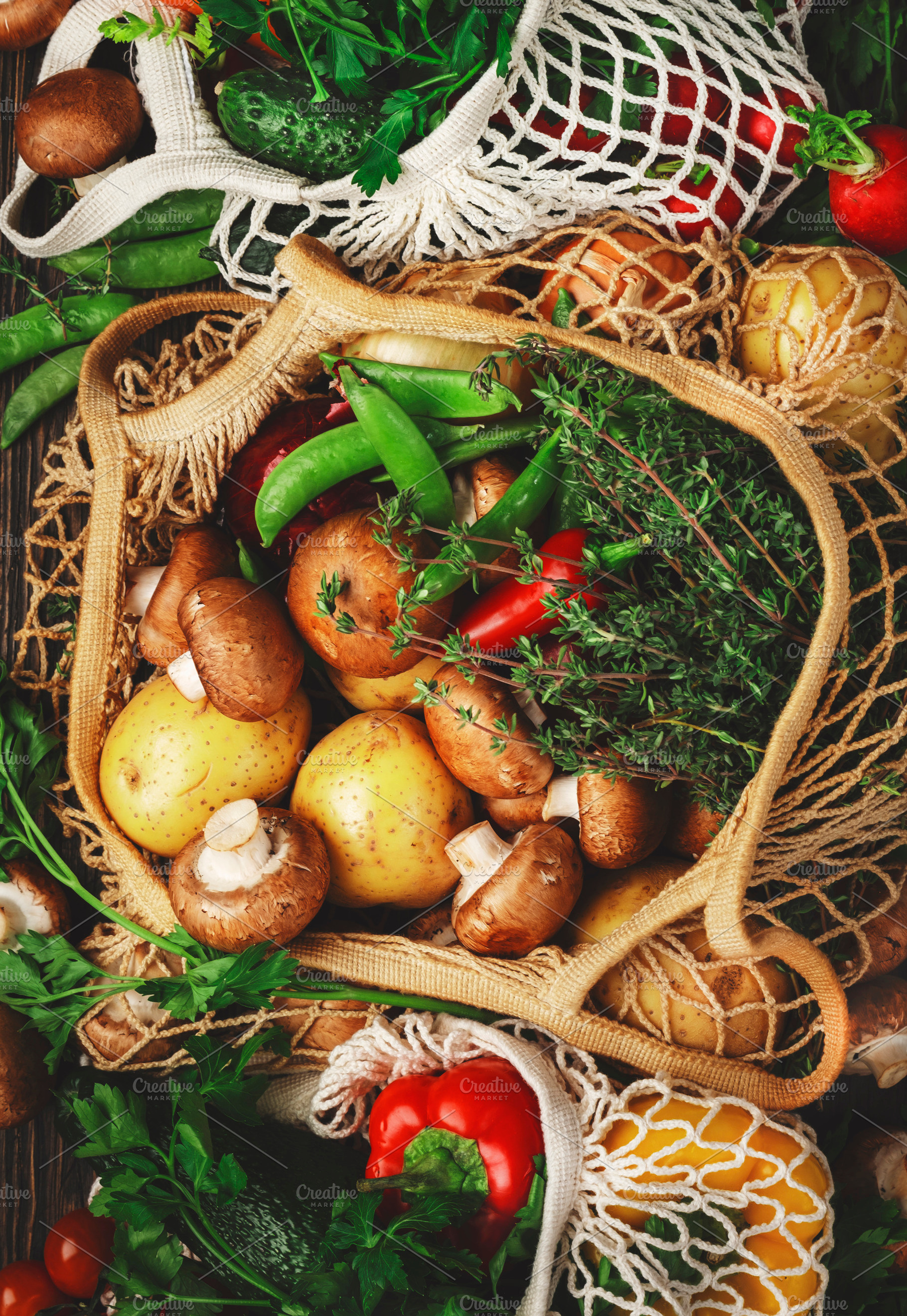 Reusable shopping textile bags full of organic spring vegetables, a Food & Drink Photo by 5PH