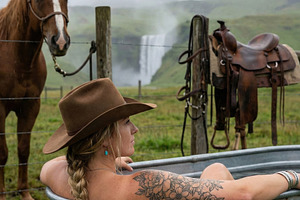 Cowgirl Relaxes in Outdoor Tub, a Person Photo by Virgo Studio