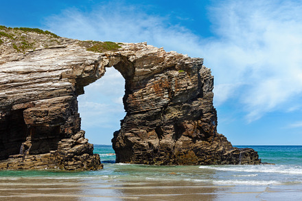 Natural arch on beach., a Nature Photo by YuriyB