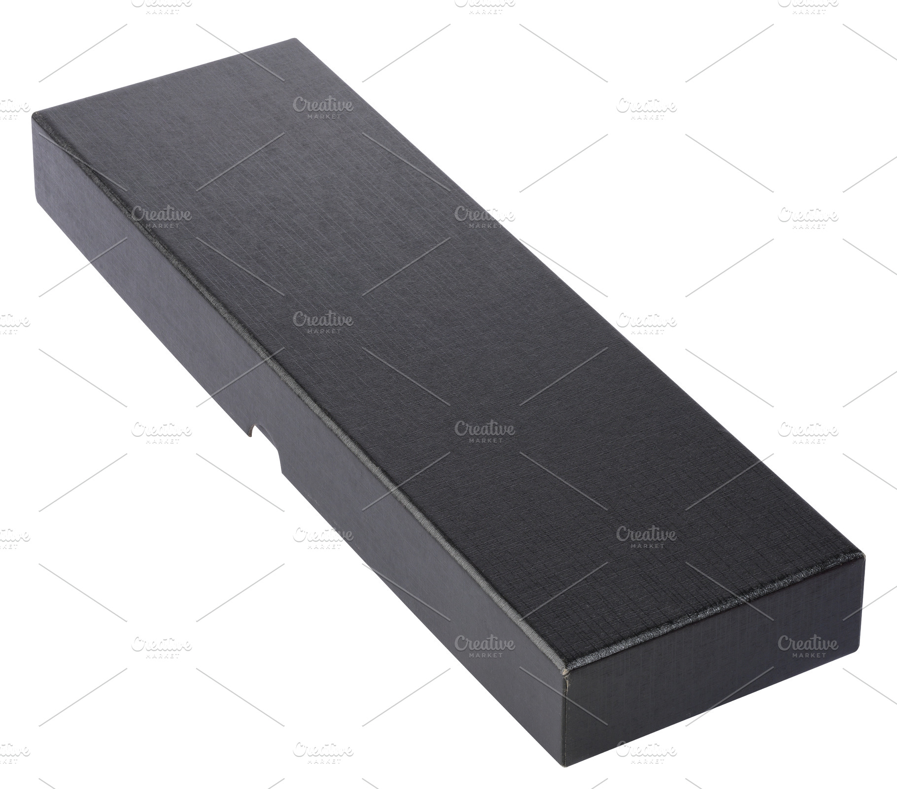 Closed long rectangular black box with textured surface on isola, an Abstract Photo by ndanko