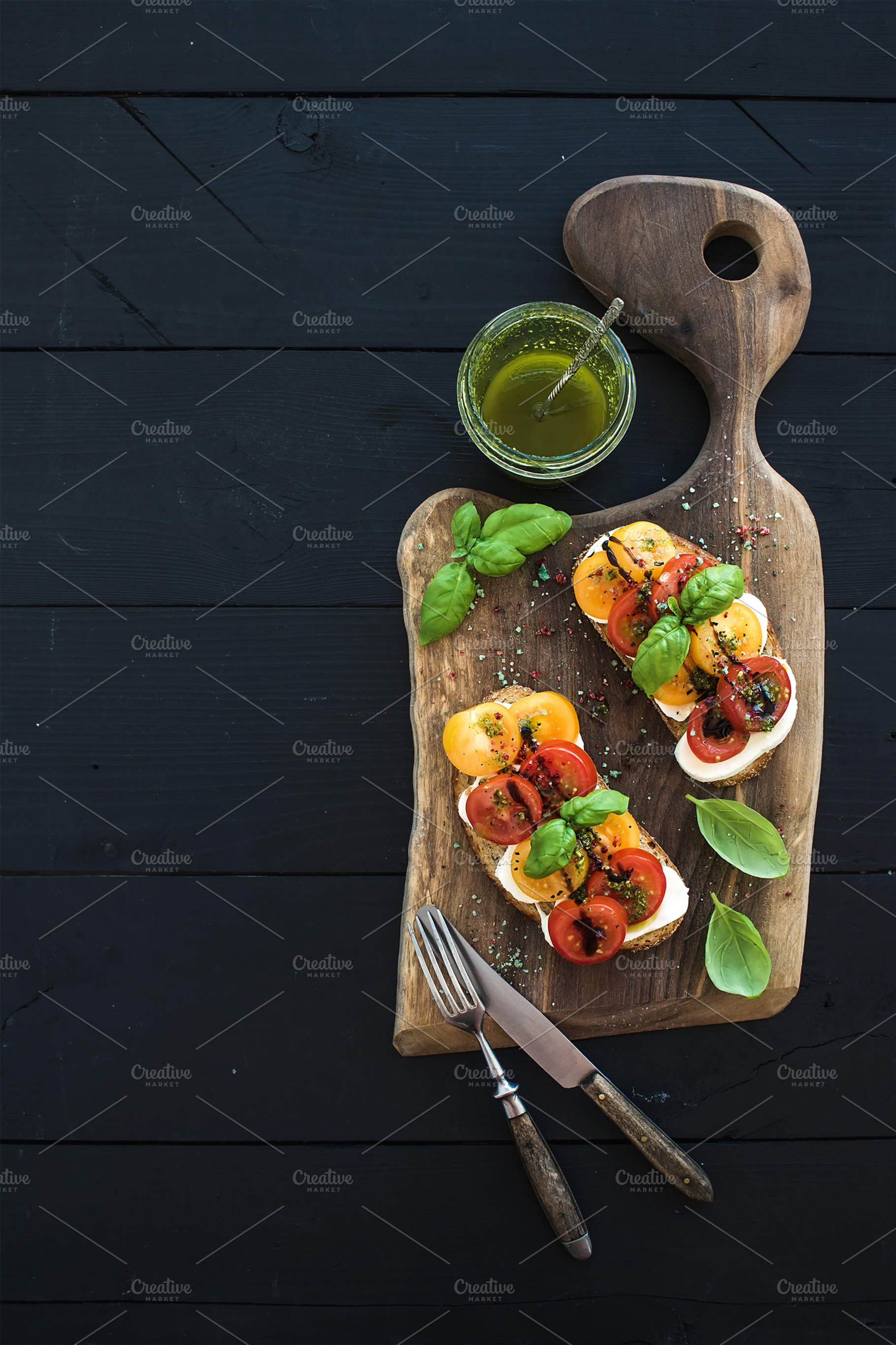 Tomato and mozzarella sandwiches containing bread, cheese, and food, a Food & Drink Photo by Foxys