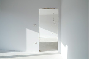 Empty doorway in unfinished, an Architecture Photo by HalfPoint