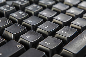 Closeup of black computer keyboard, a Technology Photo by AlyaAnd
