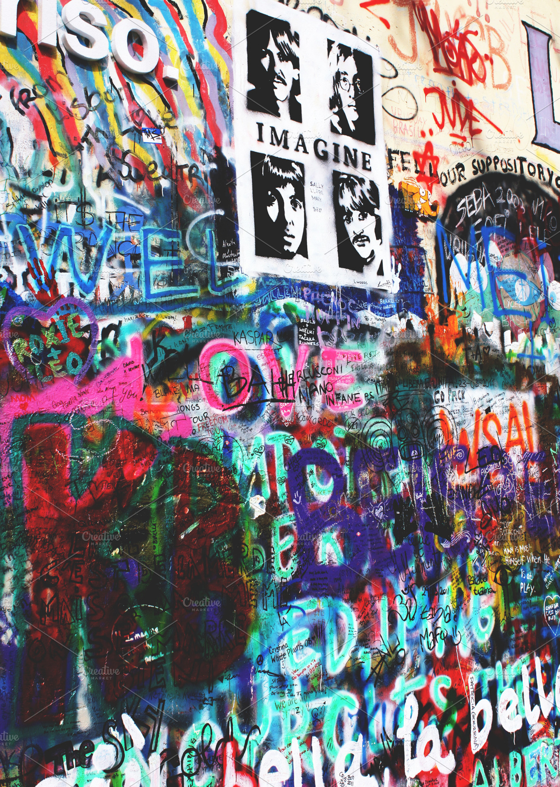 Graffiti wall containing beatles, graffiti, and graffiti wall