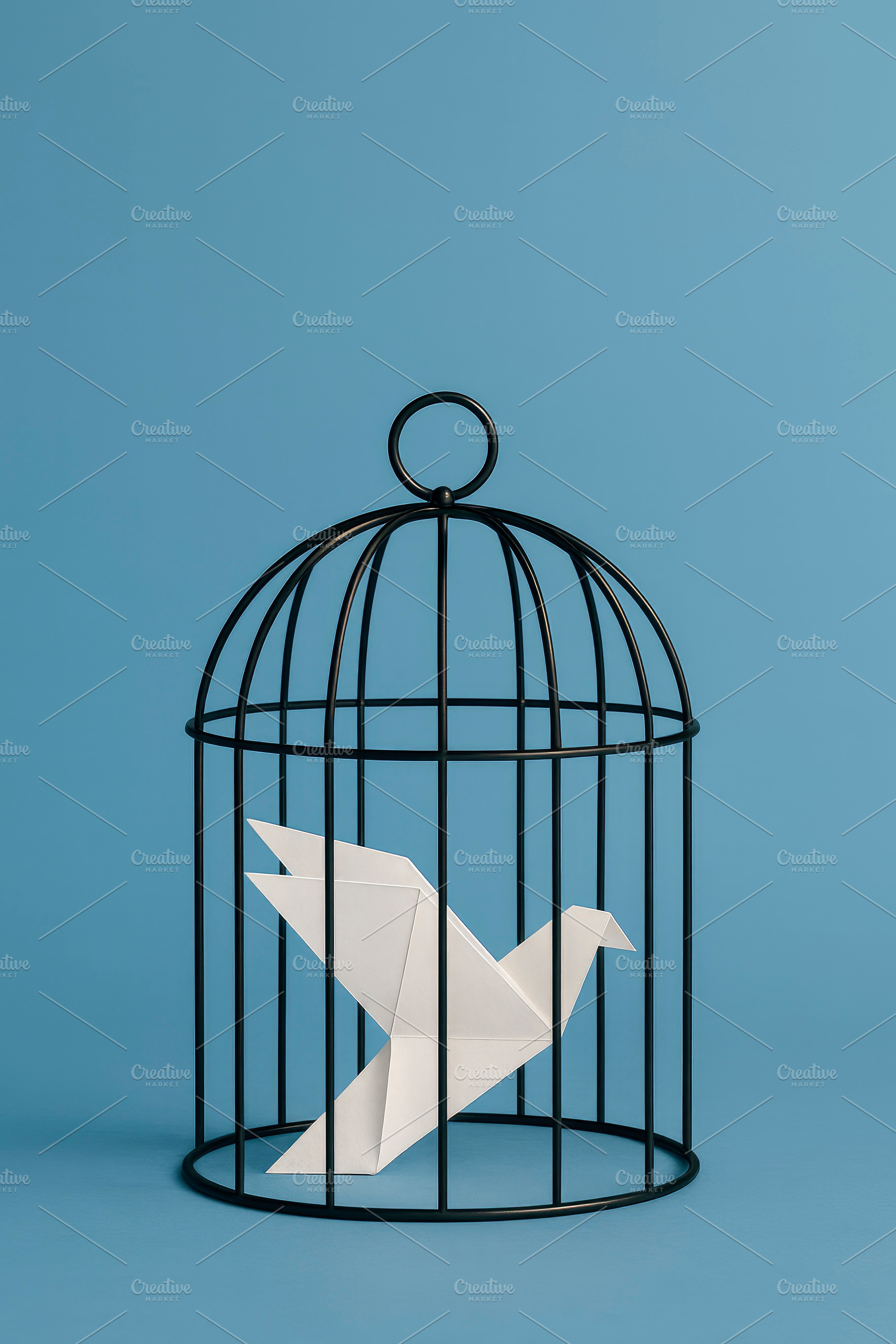 origami dove behind cage bars, generative AI, a Photo by Nito
