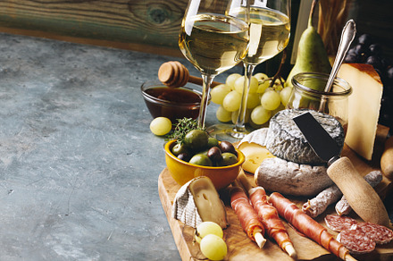 White wine with charcuterie assortme stock photo containing appetizer and, a Food & Drink Photo by Natalia Klenova's Shop
