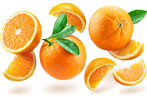 Orange fruits and slices, a Food & Drink Photo by Volff