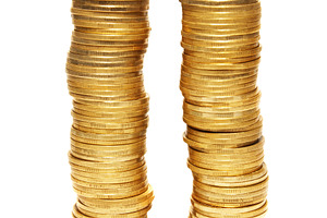 Two towers of gold coins, a Business Photo by Vapi