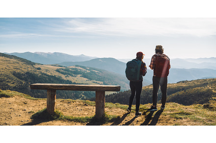 Couple of Hikers With Backpacks in