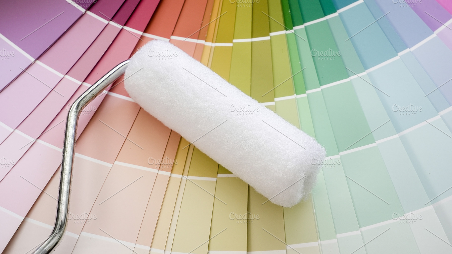 Paint roller foregrounding colorful, an Industrial Photo by 1miromiro