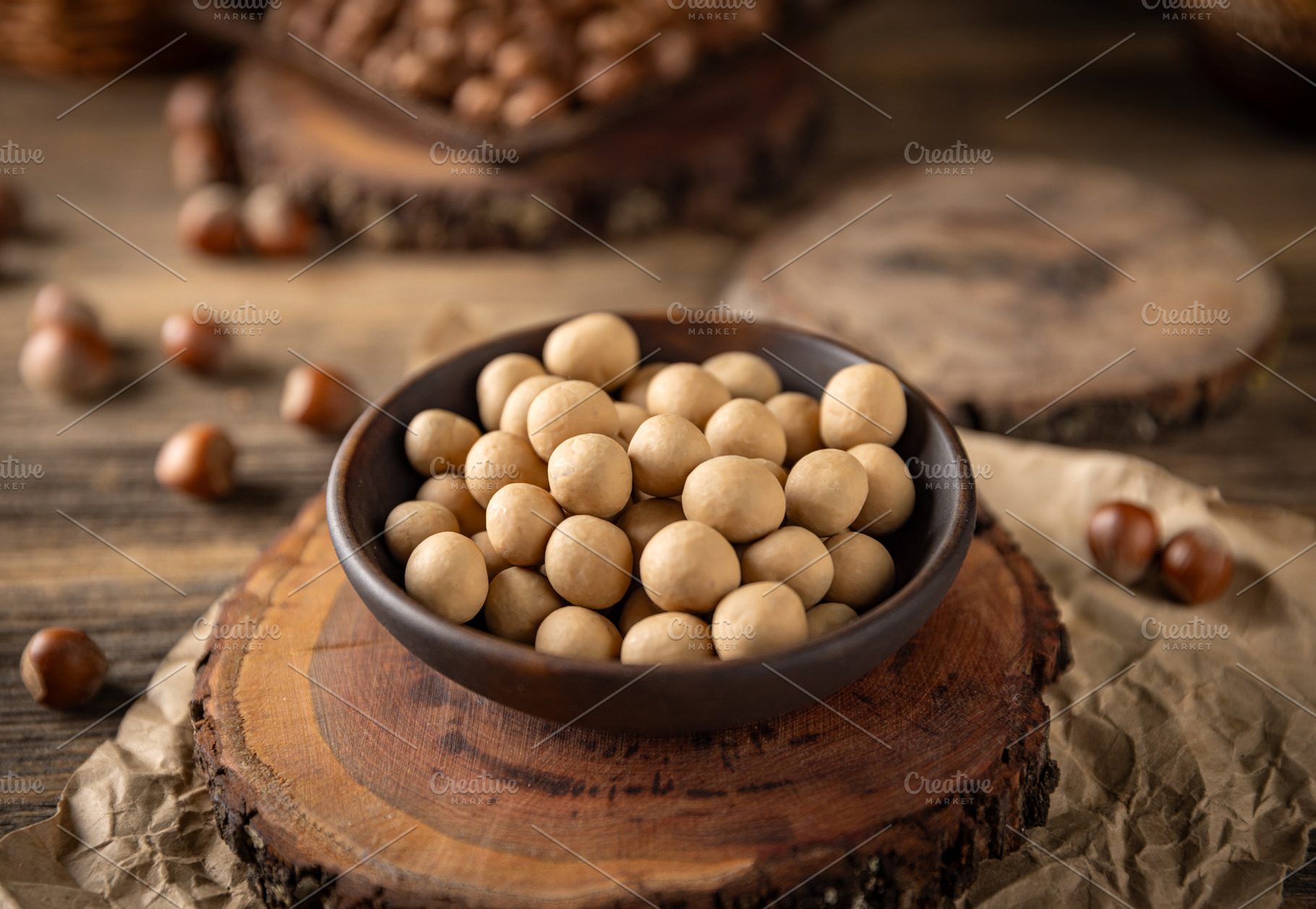 Roasted hazelnuts covered with white chocolate, a Photo by Grafvision photography