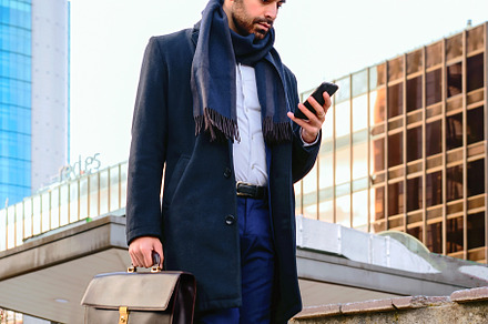 Man in suit walking down a flight of, a Person Photo by Perpis