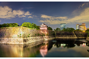 Defensive walls of osaka castle in japan containing osaka, moat, and japan, an Architecture Photo by Leonid Andronov