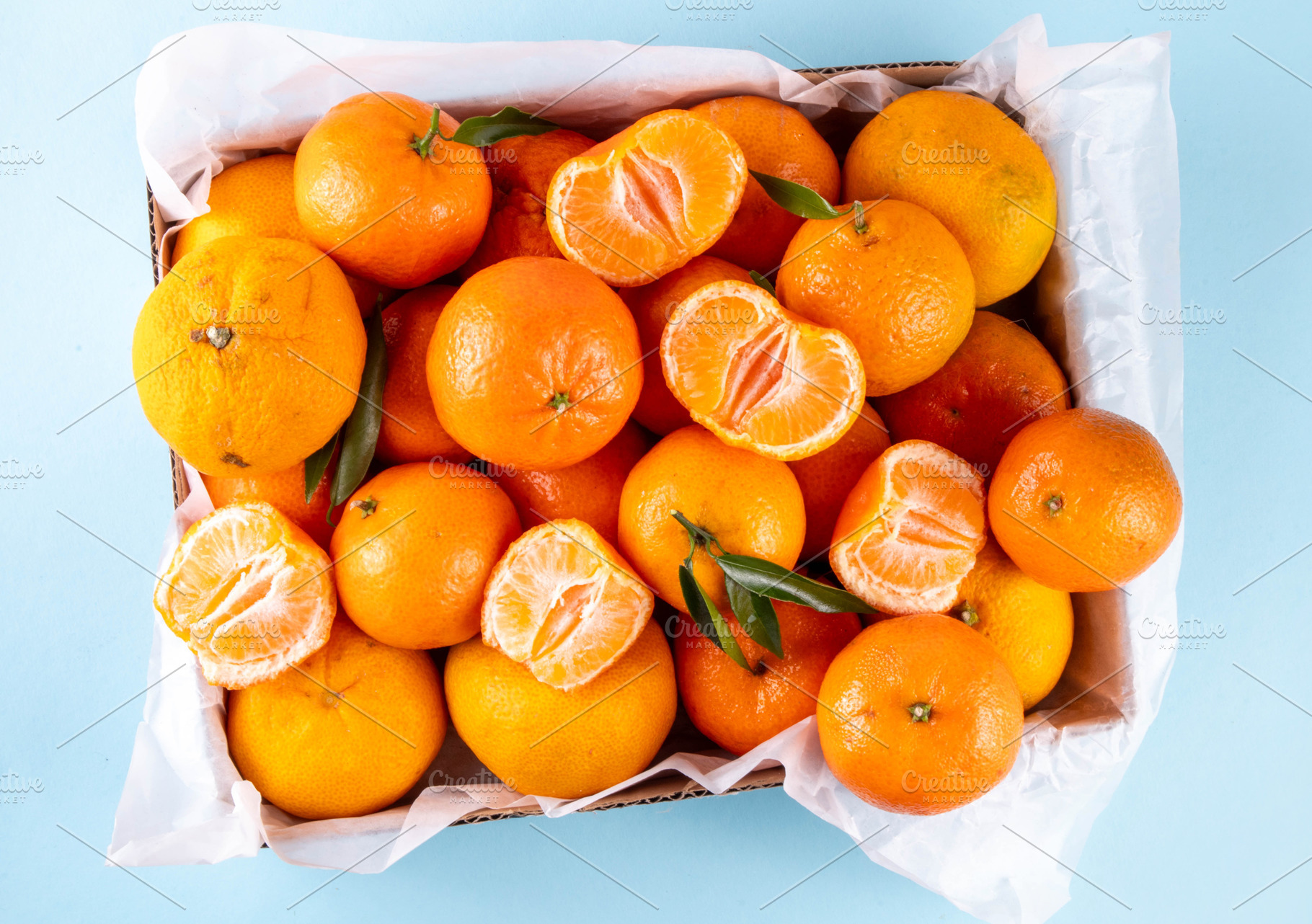 Fresh tangerines, mandarin clementines, raw farm organic citrus, a Photo by Rimma