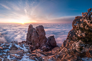 Sunrise over clouds