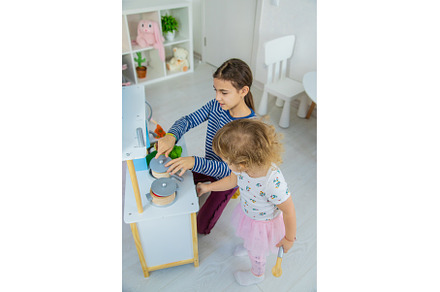 the child plays in the kitchen and, a Person Photo by yanadjana
