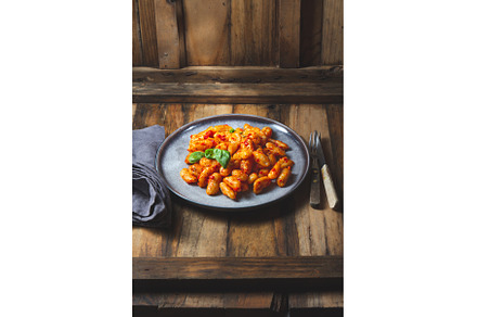 Traditional Italian potato Gnocchi, a Food & Drink Photo by LARISA BLINOVA