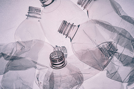 plastic pollution waste reuse litter pile bottles, an Industrial Photo by Photo Drive Studio