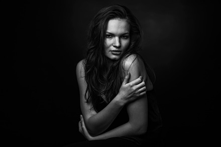 Dramatic black and white portrait of stock photo containing face and natural