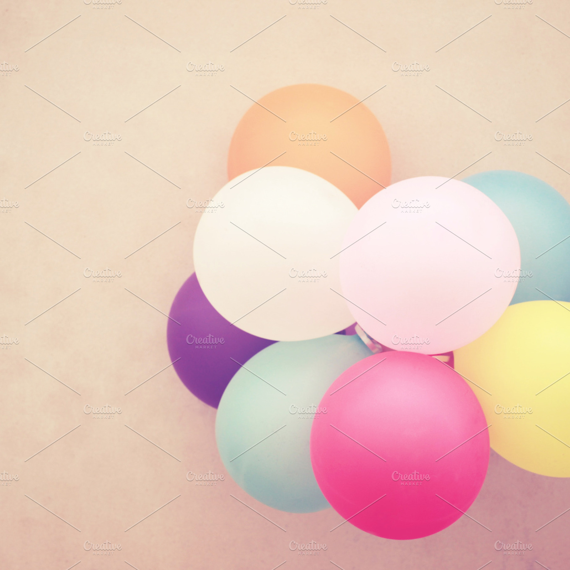 Colorful balloons on wall