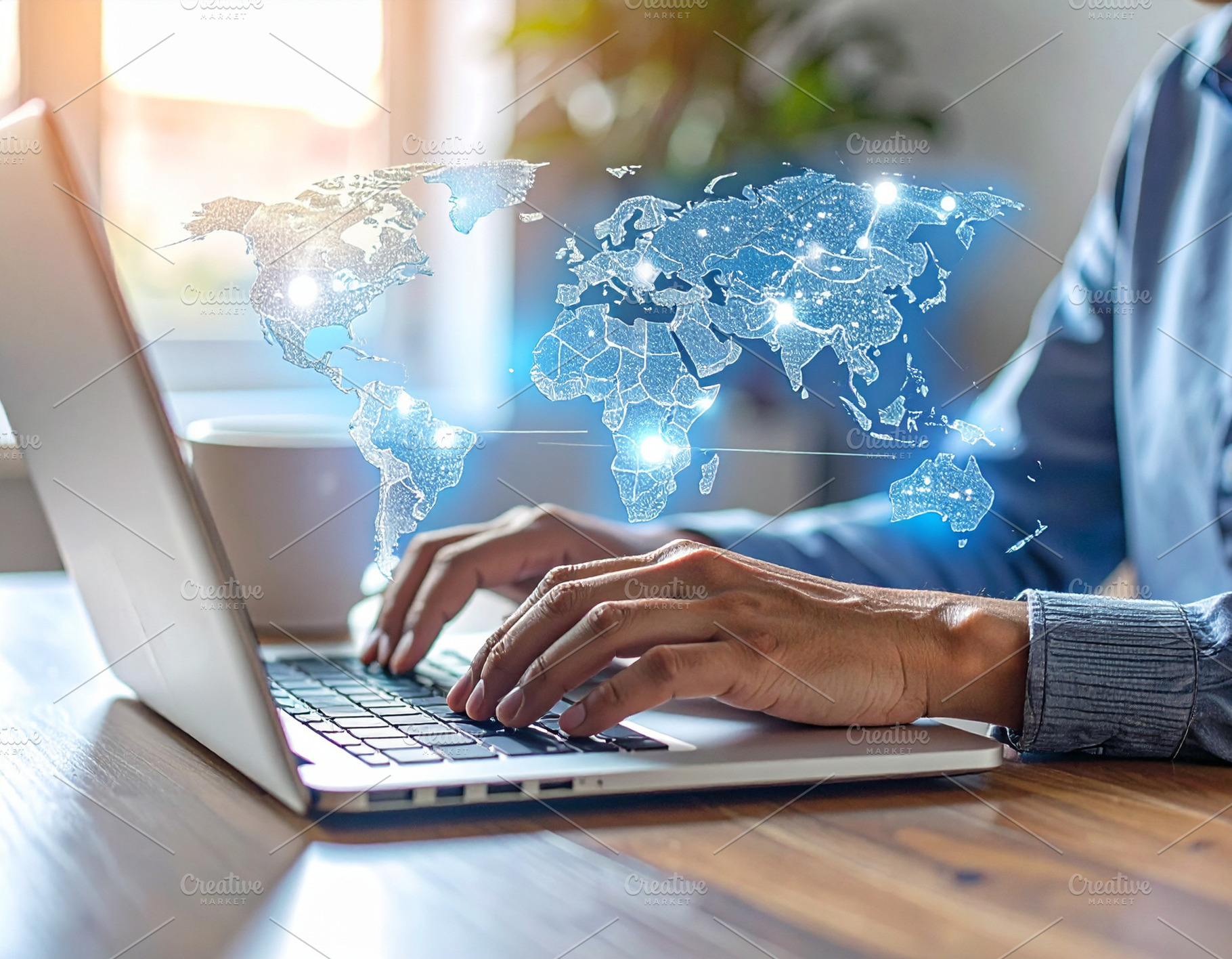 Hands typing on a laptop with a floating hologram map, a Technology Photo by DanFLCreativo