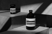 10 PSD Dark Cosmetic Bottle Mockup, a Packaging Mockup by East Gallery (Thumbnail 1 of 11)