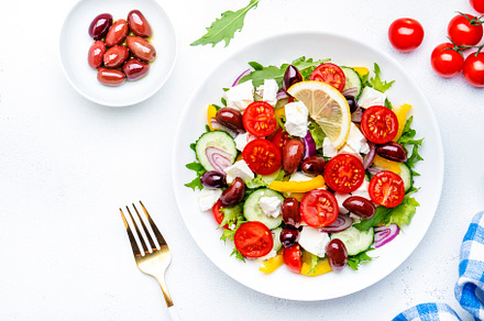 Traditional greek salad with feta cheese, kalamata olives, tomat, a Food & Drink Photo by 5PH
