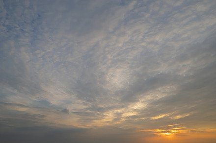 Sunset sky. Abstract nature background. Dramatic blue with orang, a Background Photo by Tampatra