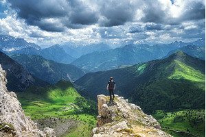 Mountain landscape with a hiker, a Nature Photo by den-belitsky