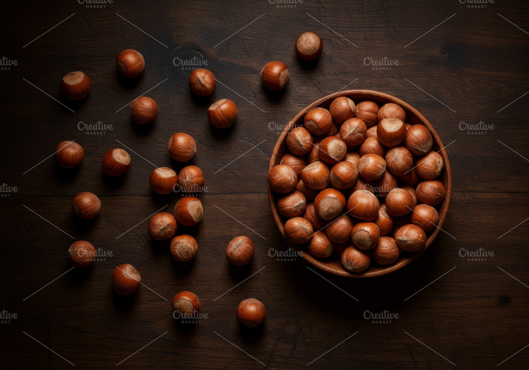 Whole hazelnuts in a wooden bowl wit, a Food & Drink Photo by professorinc