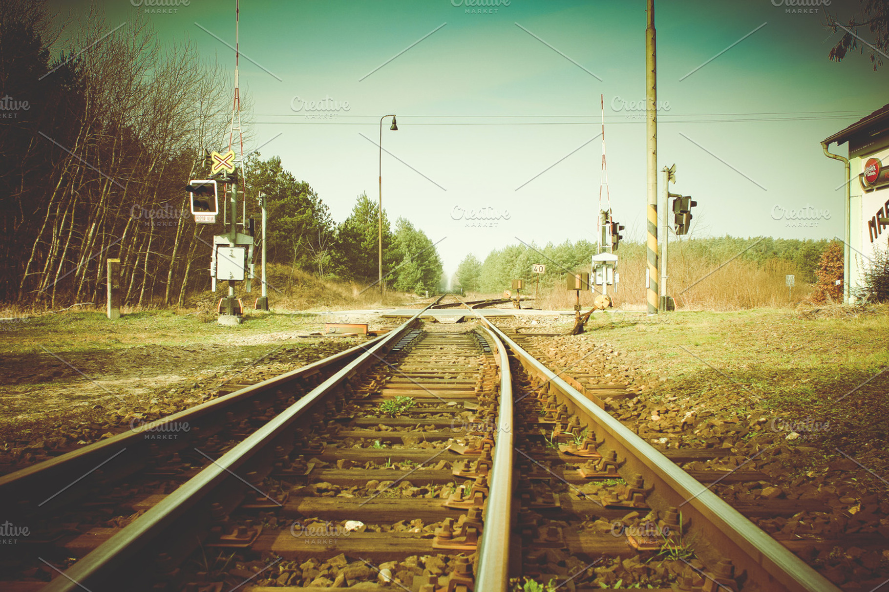 Railway crossing containing railway, crossing, and train