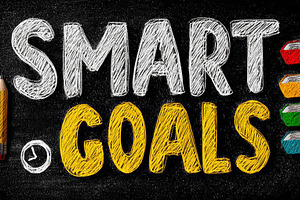 Smart goals concept chalk lettering on blackboard with pencil and colorful chec, a Photo by AS photostudio