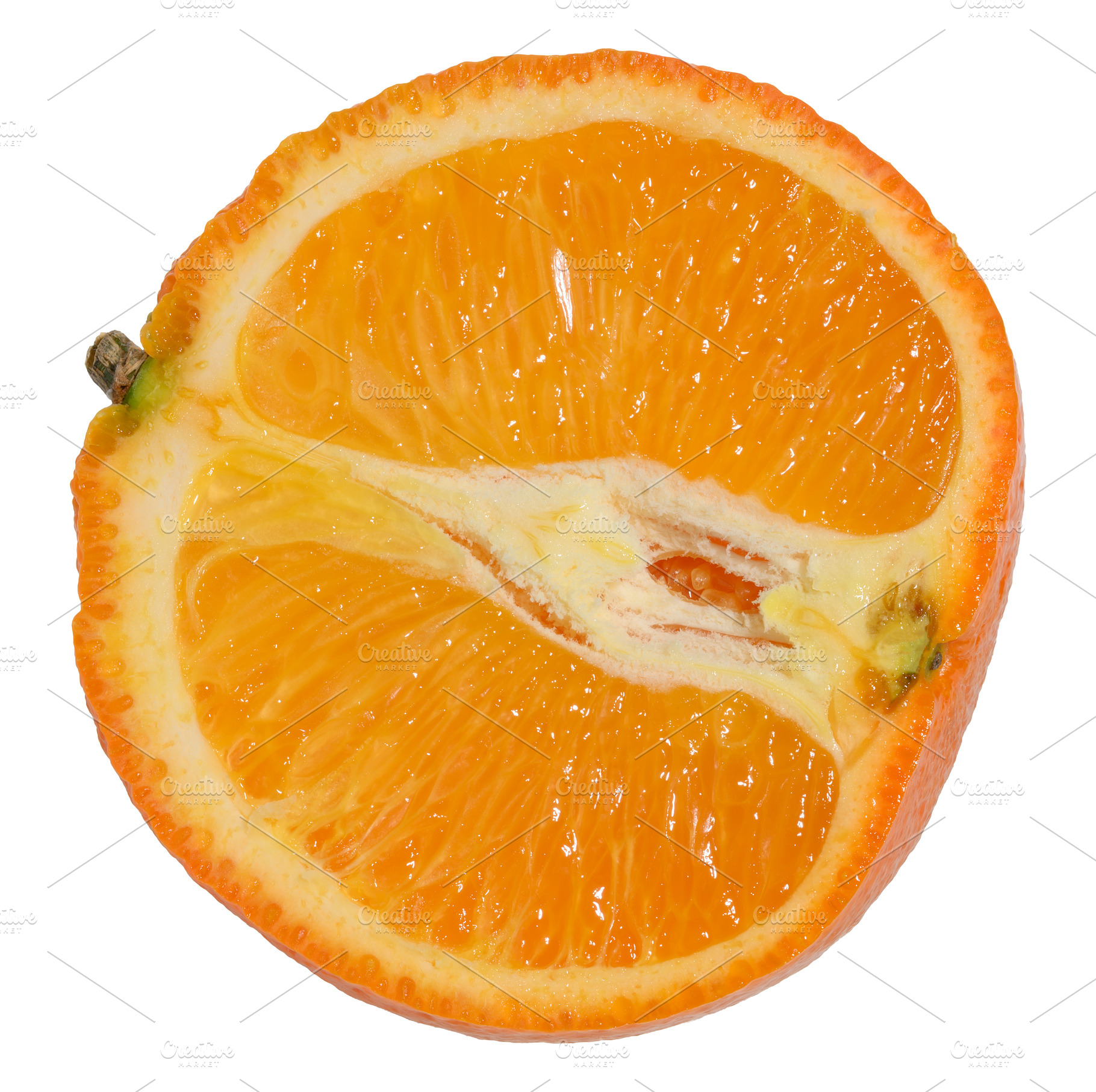 Half of a ripe orange in a cut on an isolated background, a Food & Drink Photo by ndanko
