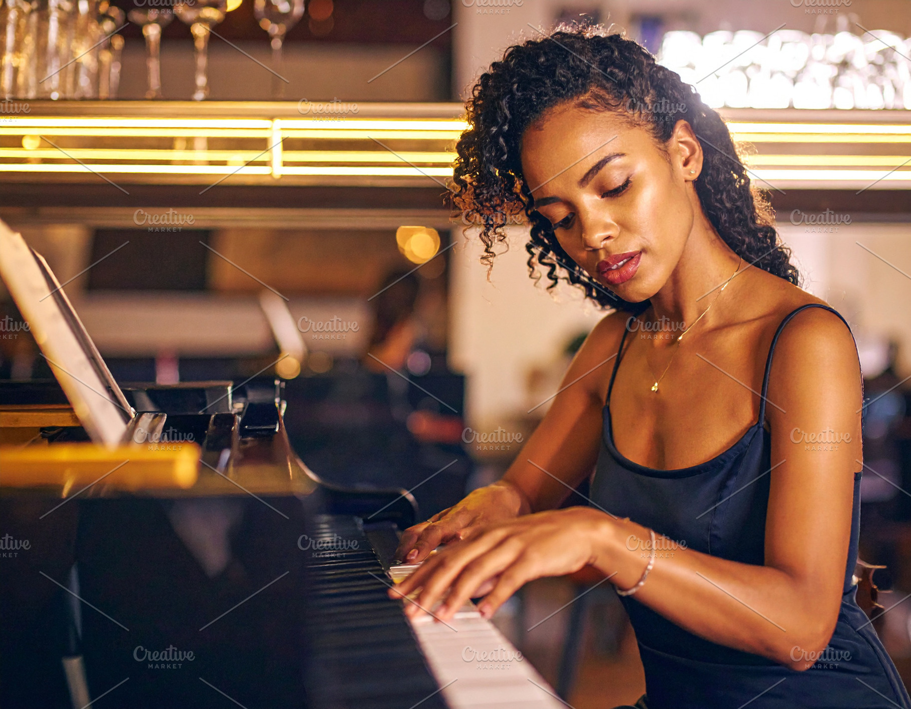 Adult pianist performing at the piano in a small bar, a Person Photo by DanFLCreativo